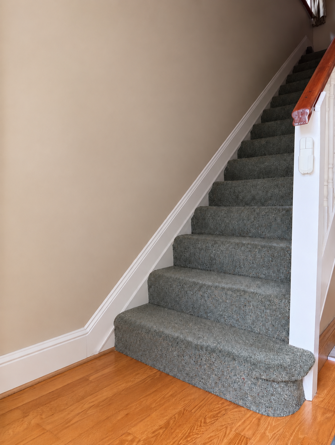 Kay’s empty staircase in Walkinstown before the straight stairlift was fitted